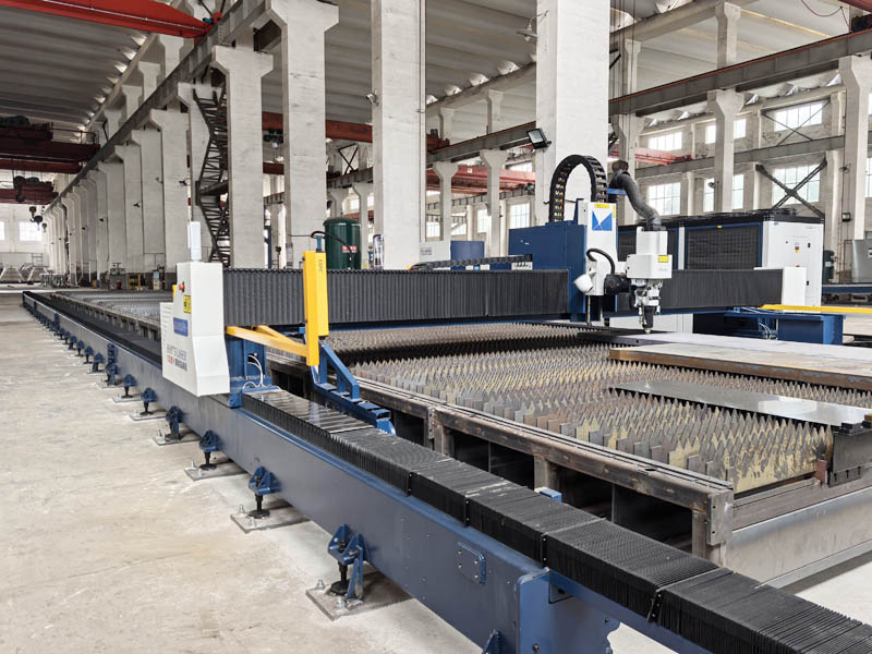 Laser cutting and beveling machine